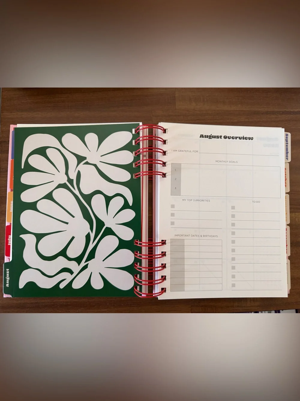 Pulsar Planner with Pink Background and Red Abstract Floral